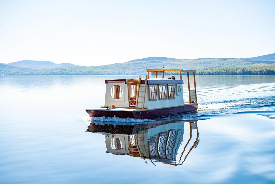 Maine-Cabin-Rentals-Rengeley-Roam-Boat-Exterior