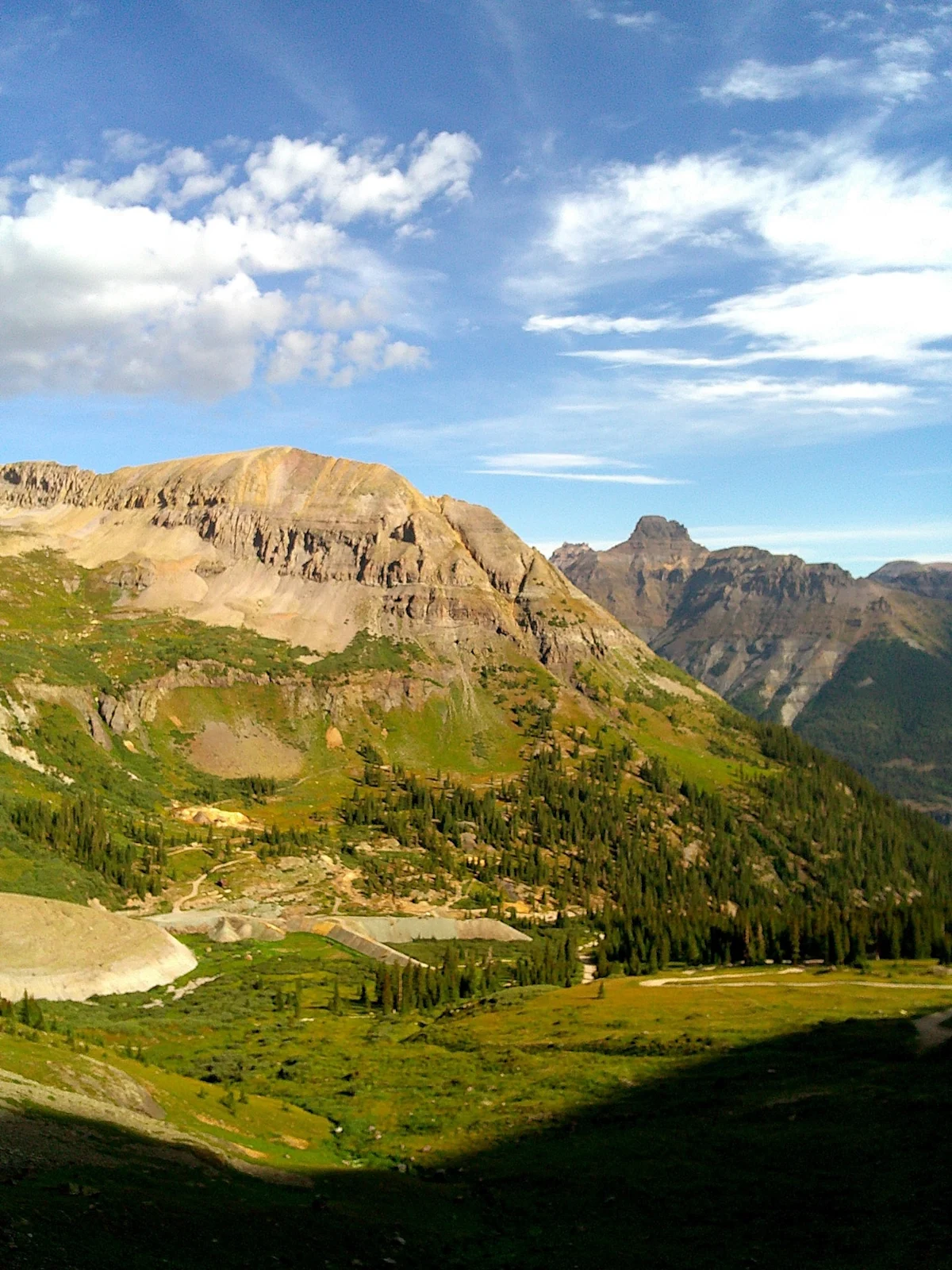 camp-snap-review-vintage-filter-vertical-mountain-with-trees