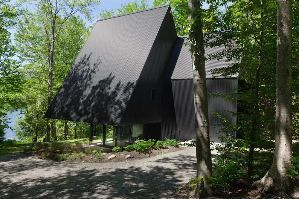 This Austere Home Finds Shape In an A-Frame's Shadow