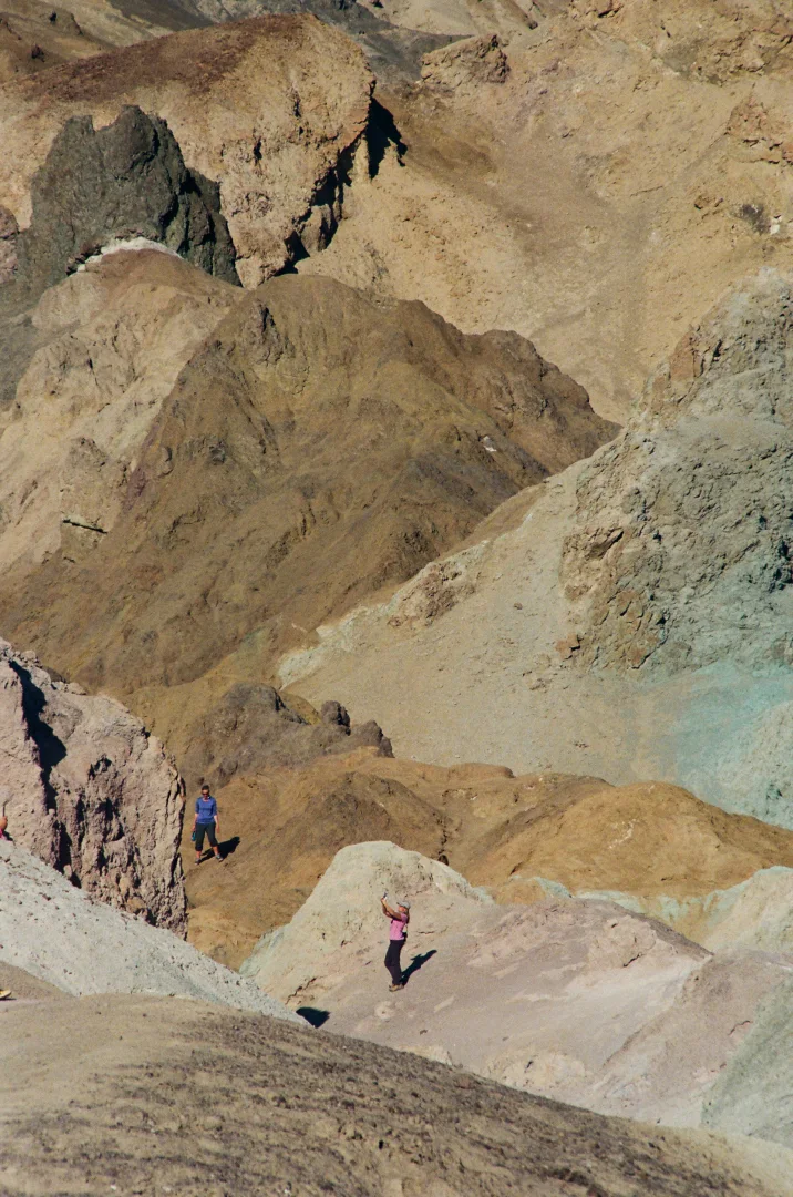 bullion-death-valley-hikers-exploring-golden-hills