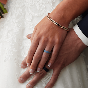 Denim Thin Rise ring Shown on a married couples hands