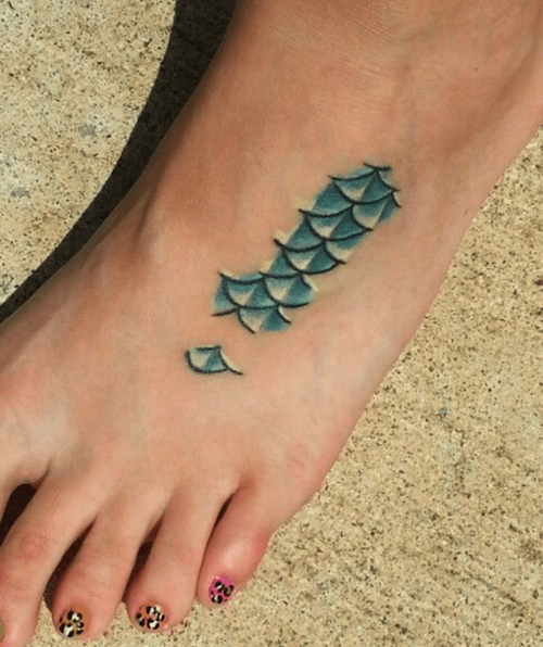 just keep swimming foot tattoo