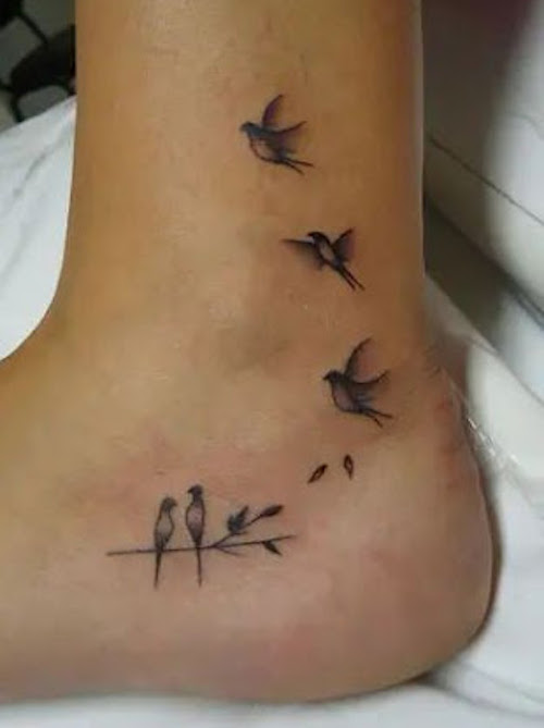 hip bone tattoo birds