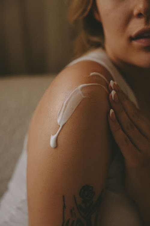 Woman Applying Skincare