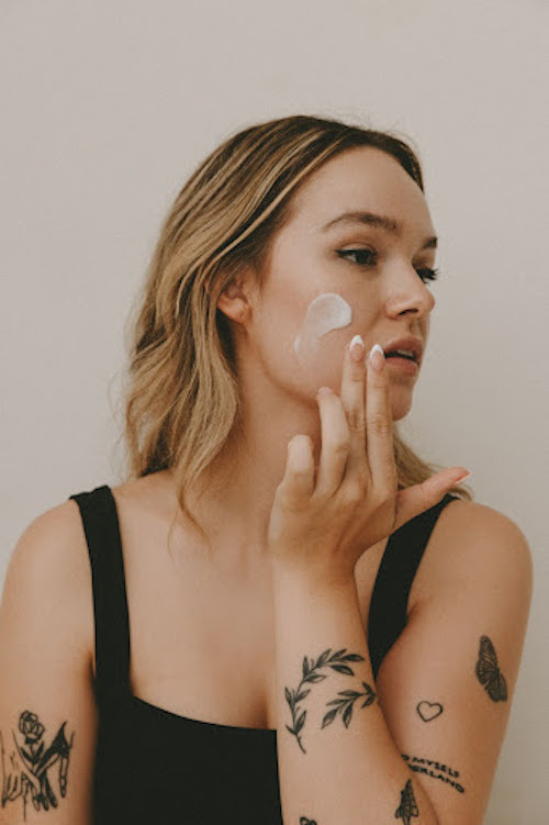 Woman Applying Skincare