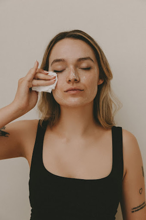 Woman Wiping Face