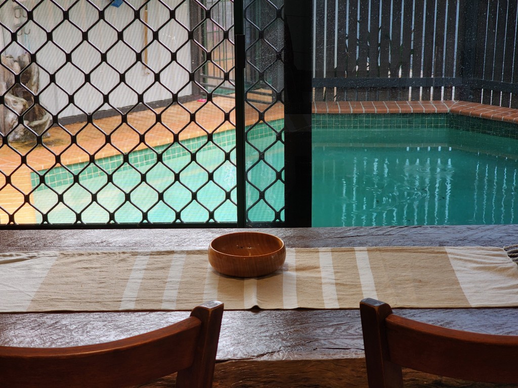 View of pool from dining table