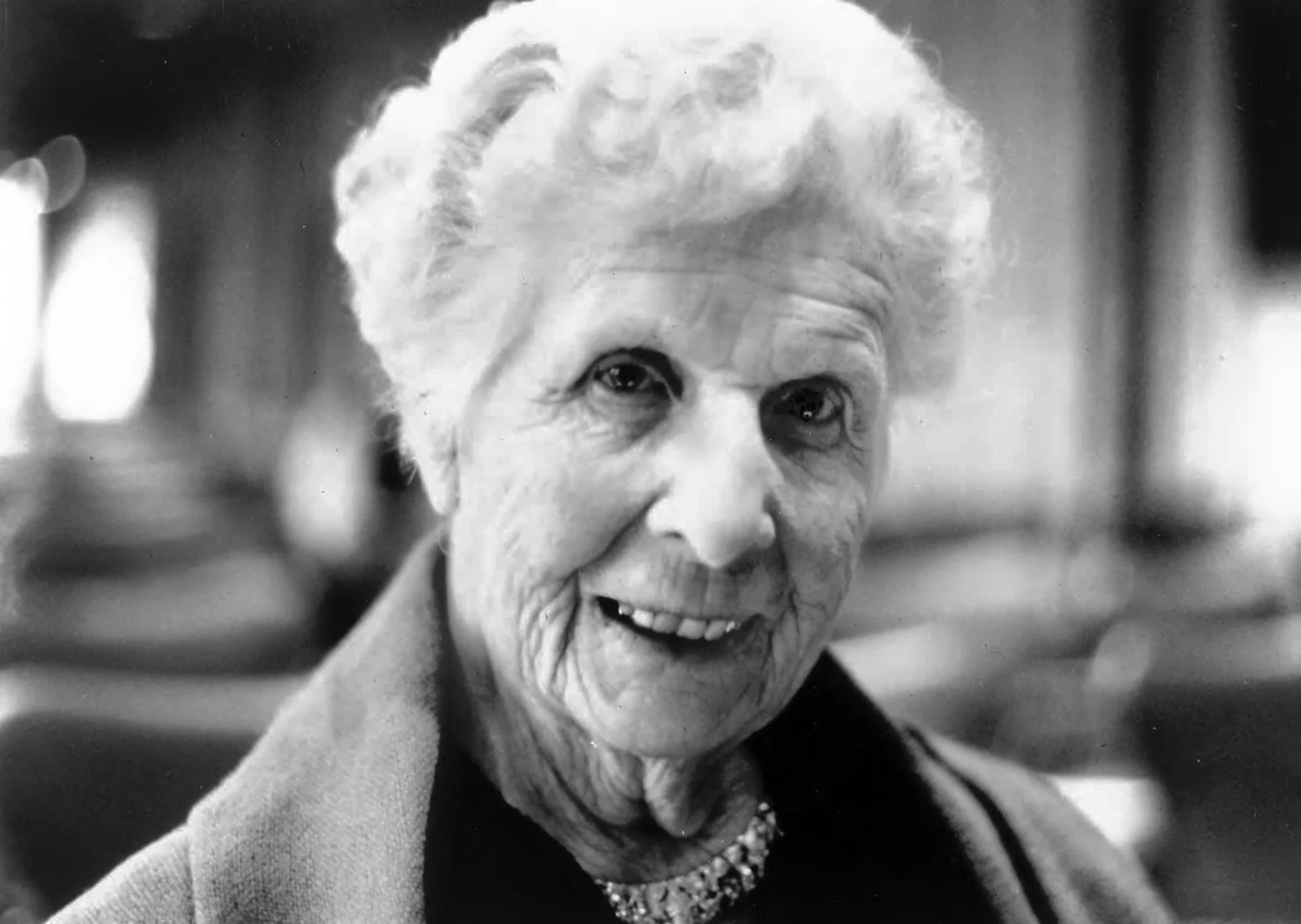 A black and white photograph of Adele Duttweiler on her 95th birthday