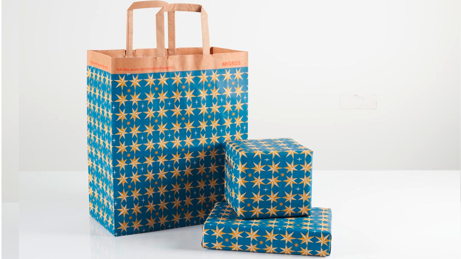 A Migros shopping bag as wrapping paper