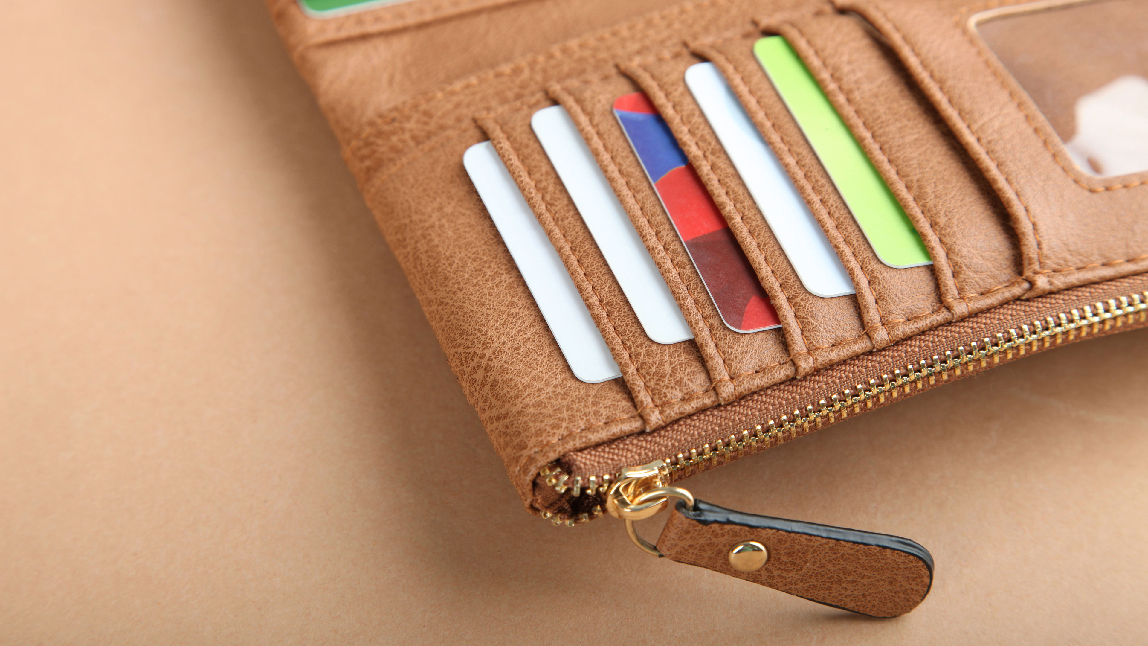 Brown wallet with different bank cards
