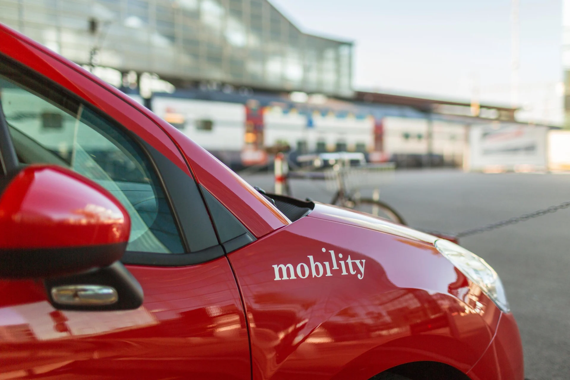 Red vehicle from the Mobility Carsharing fleet