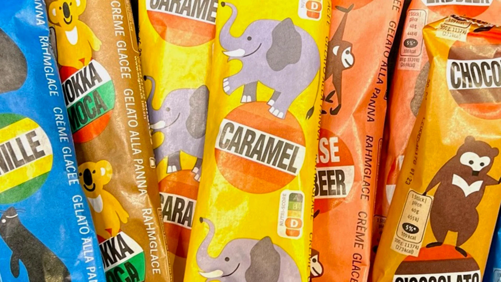 Diversi gelati iconici della Migros, al centro il gusto caramello con l’elefante
