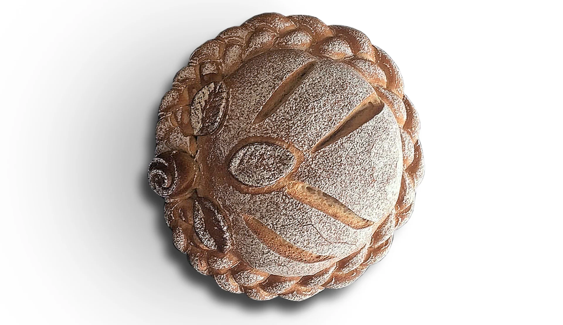A round loaf with floral decoration