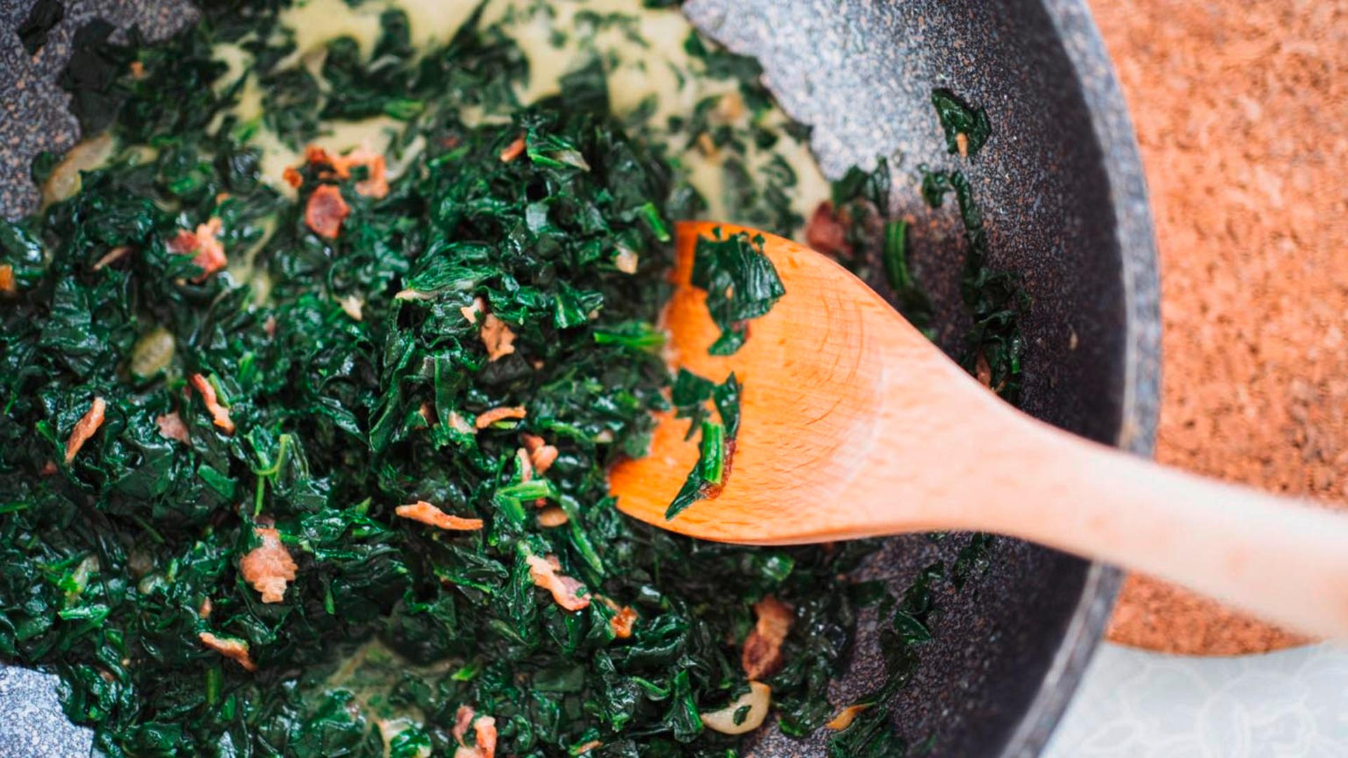 Chopped spinach in a frying pan