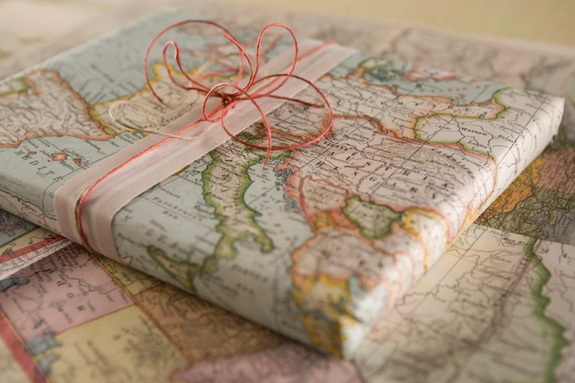 A gift wrapped in a map
