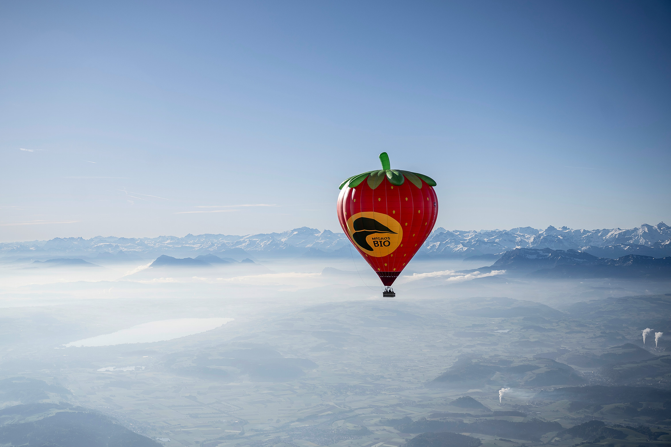 Migros organic strawberry balloon in the air