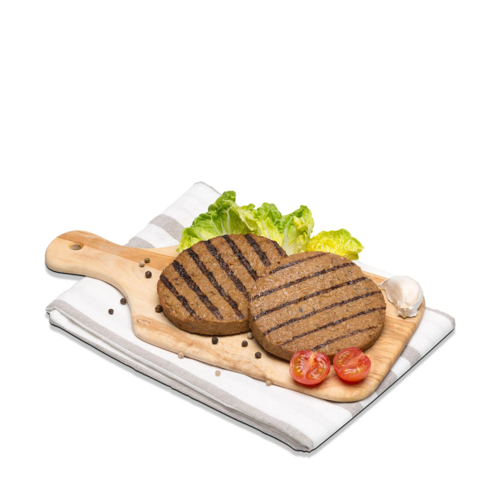 Burger V-Love su un piccolo tagliere con guarnizione.