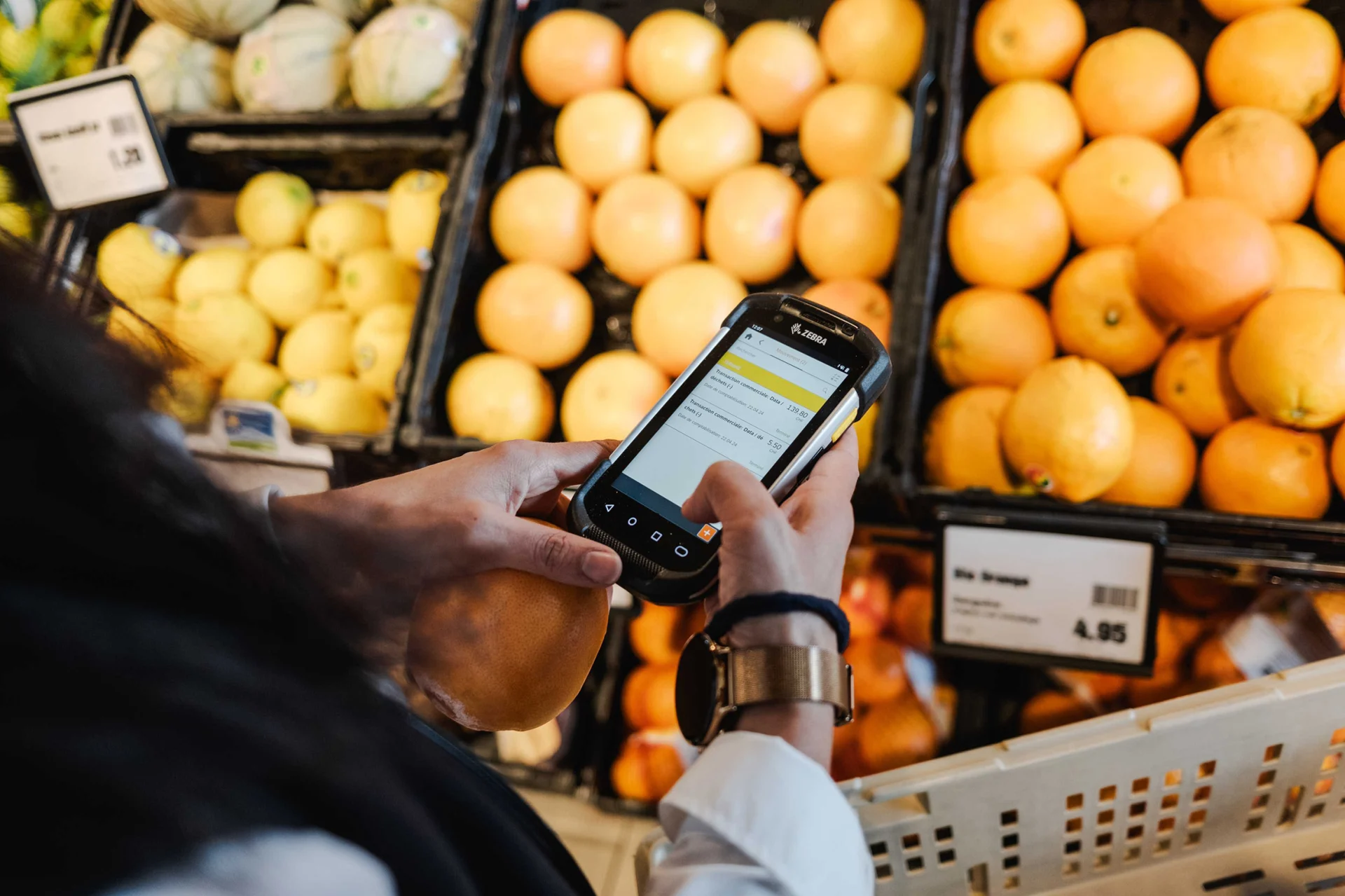 The store manager manages products on a mobile device