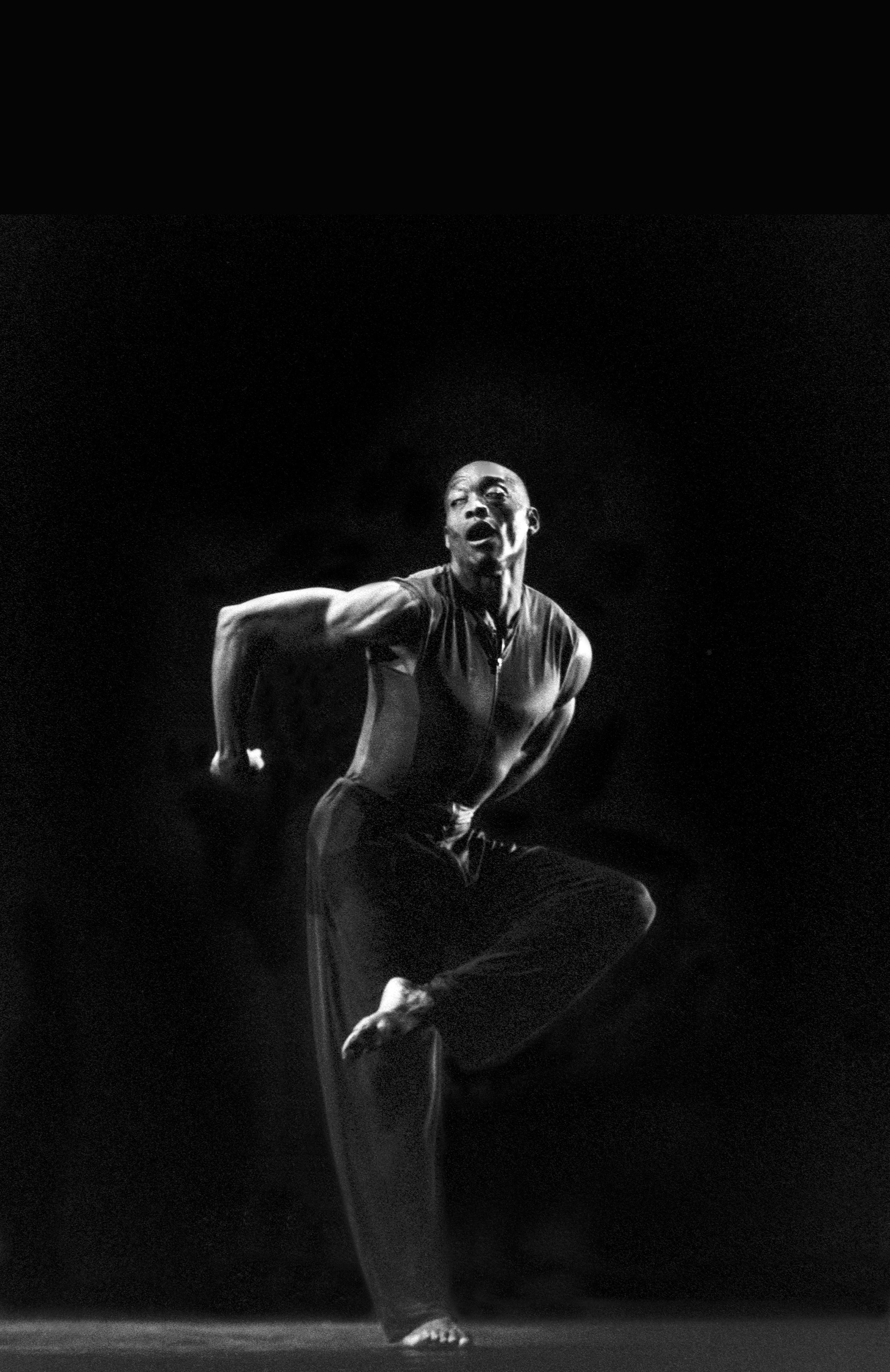 A black-and-white photograph of a dancer