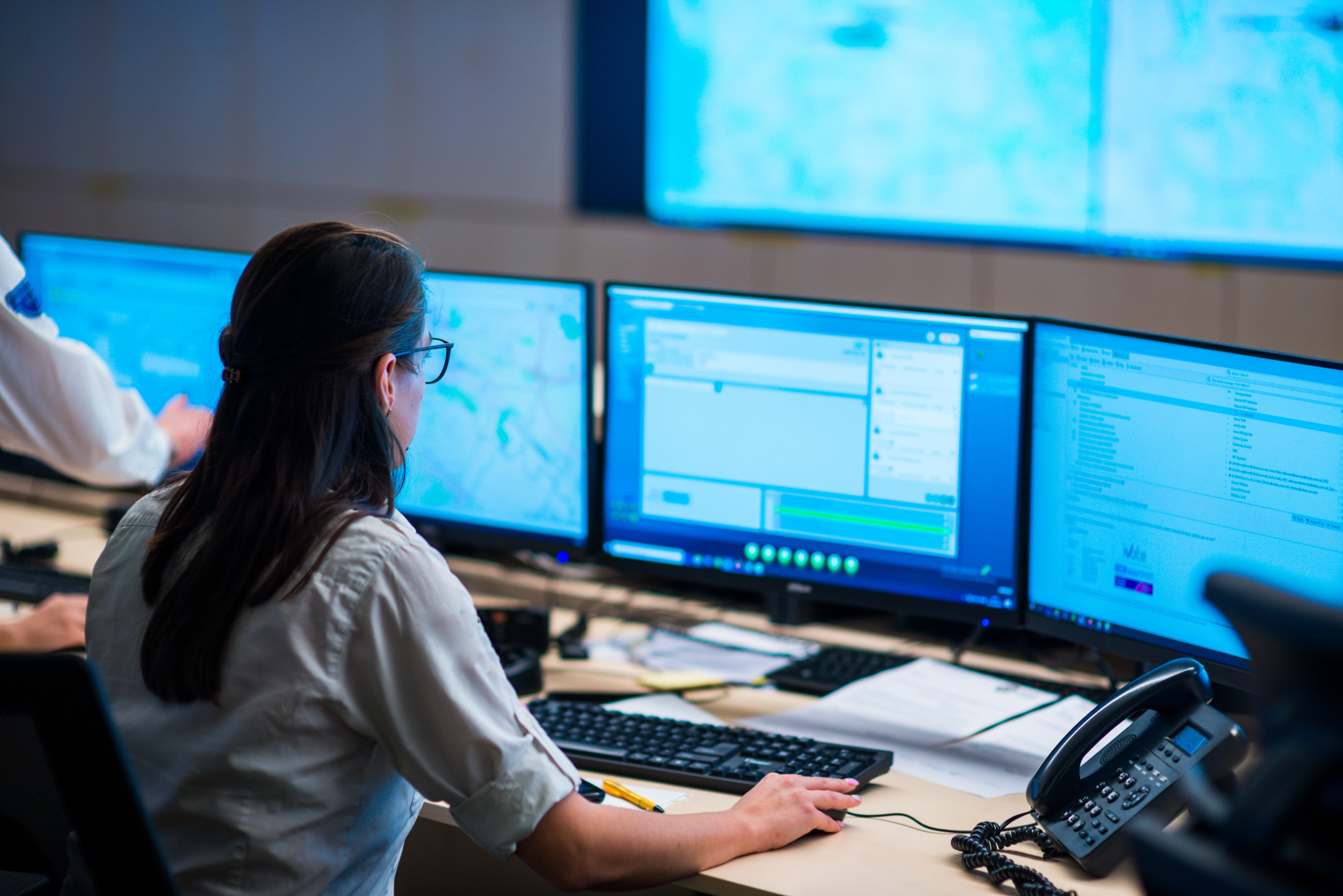 Woman at Computer Monitors