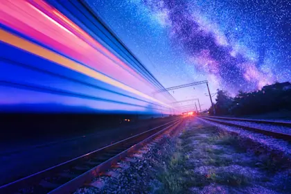 High speed train in motion on a starry night