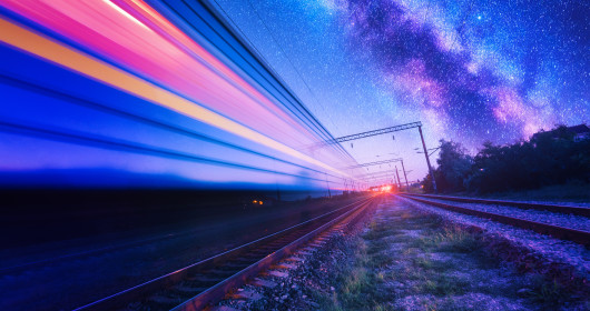 High speed train in motion on a starry night