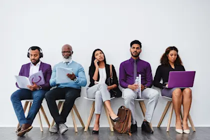 Group of people waiting to be interviewed