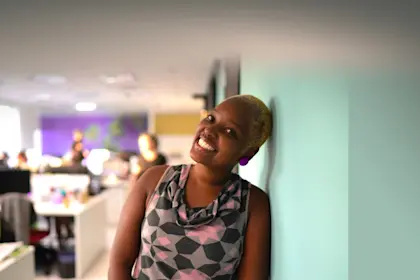 Woman in an office smiling