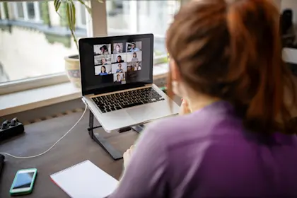 Women looking at laptop abstract