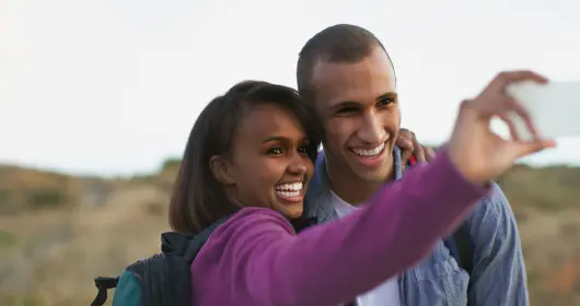 couple taking selfie outdoors