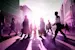 People walking on purple background