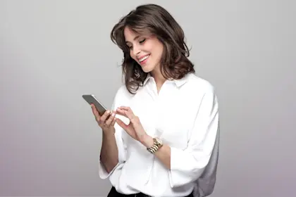 Woman looking at something on cell phone