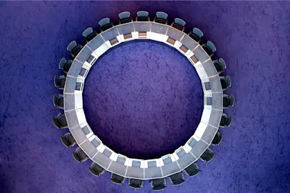 Chairs around circular table, overhead view
