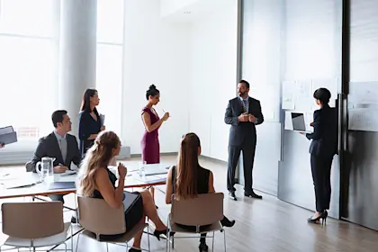 group of business people brainstorming in a conference room