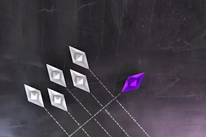 paper boats on blackboard 
