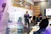 businessman presenting to a group in a conference meeting room