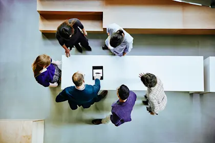 Business colleagues discussing office project