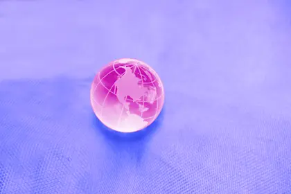 Glass globe on a purple background