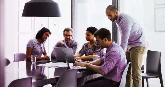 group of people in a casual business meeting