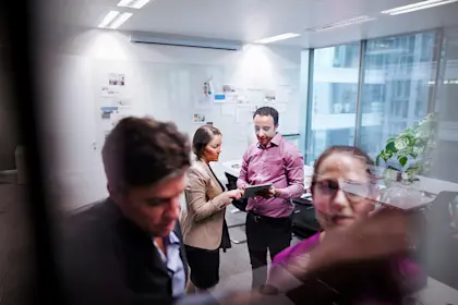 colleagues brainstorming in a modern office