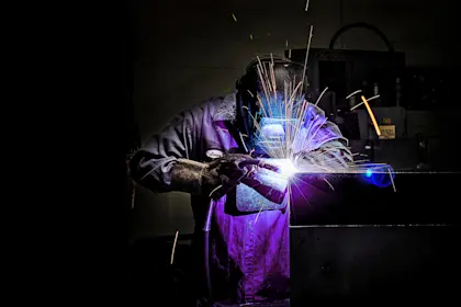 welder welding in workshop