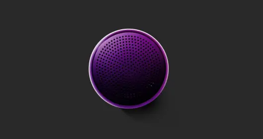 purple bluetooth speaker on gray surface