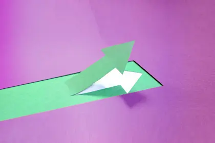 Green arrow pointing up on purple background