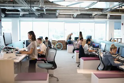 Creative business people working at computers
