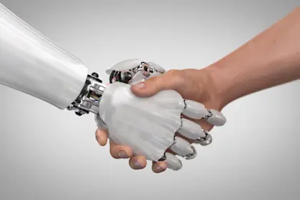 Robot and man shaking hands