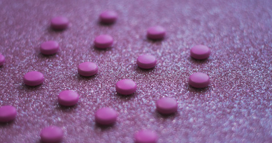 close up shot of purple pills
