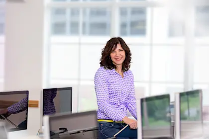 Woman sitting in computer lab