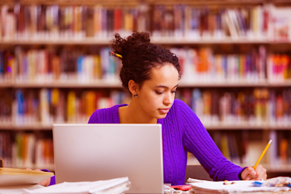 girl studying in library