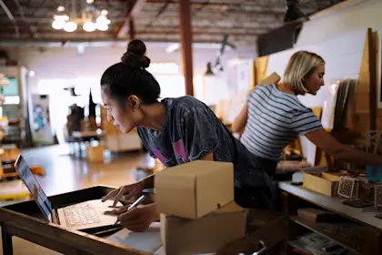 Women packaging merchandise 