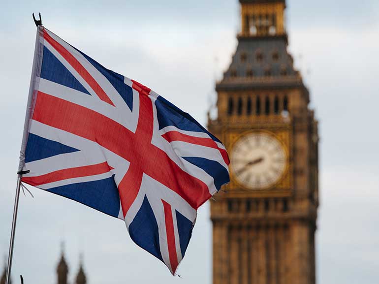 An image of the Big Ben and the UK's flag 